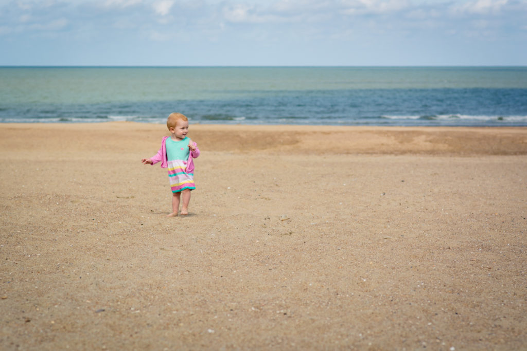 Kinderfotografie spontaan zee Amber